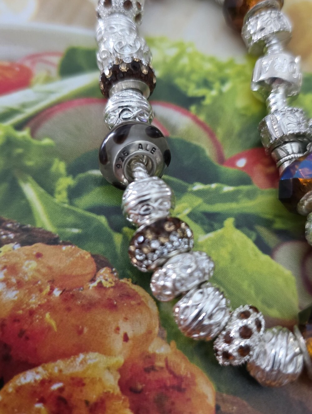 7-inch Pandora-style bracelet with a genuine Pandora bead (see photos).